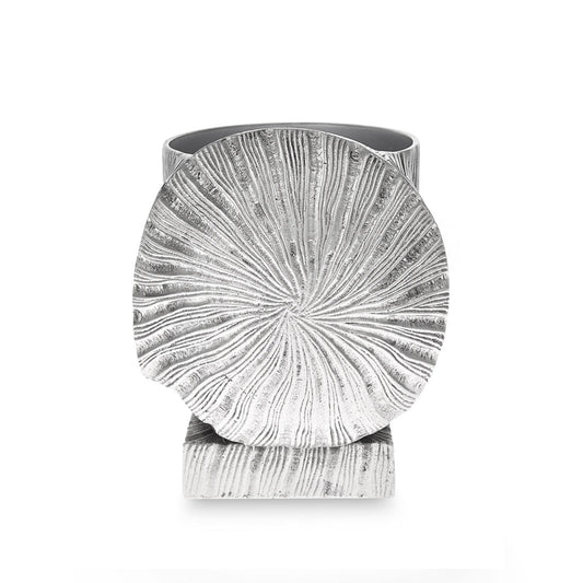 Embossed metal plant pot holder detail with pattern